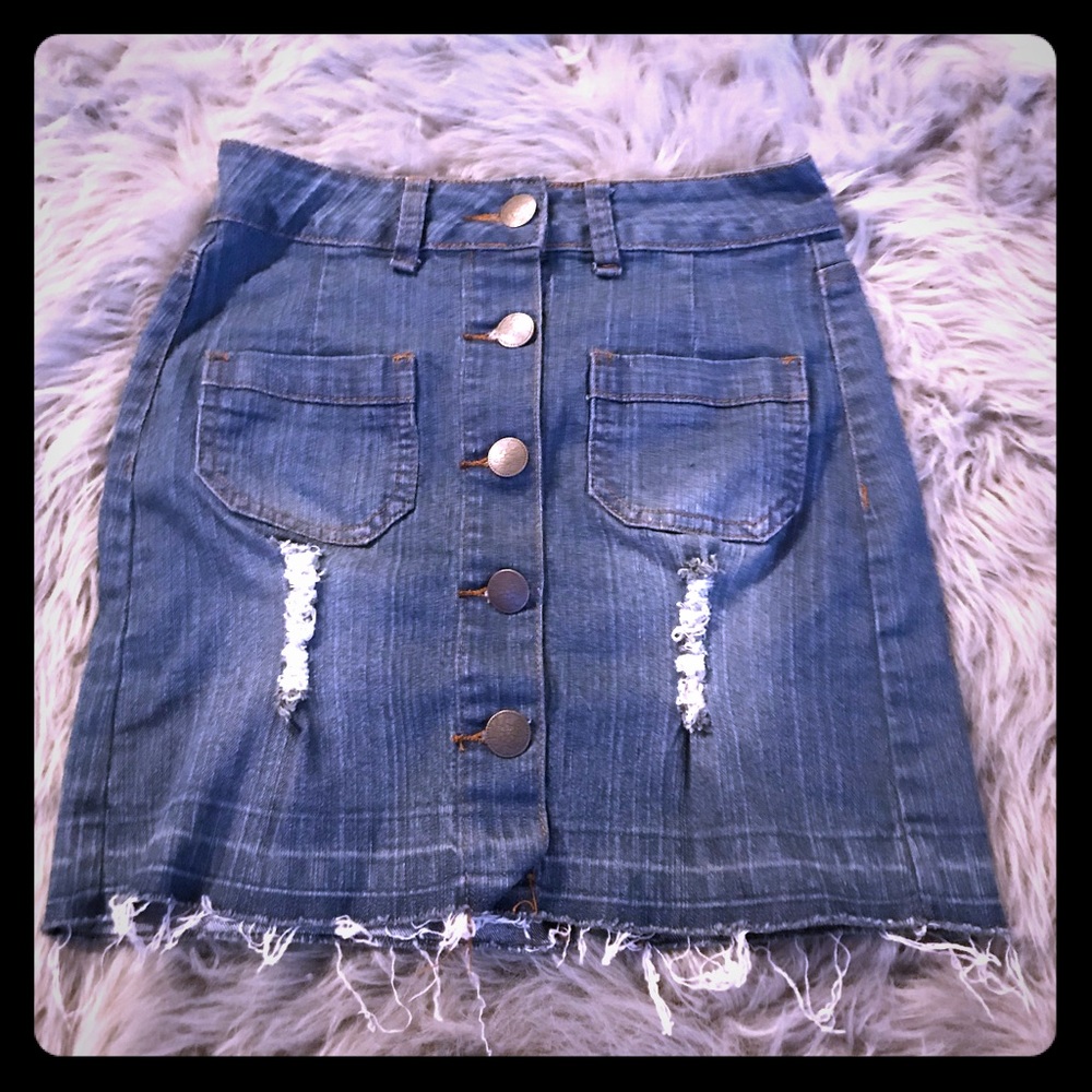 A ripped jean style skirt